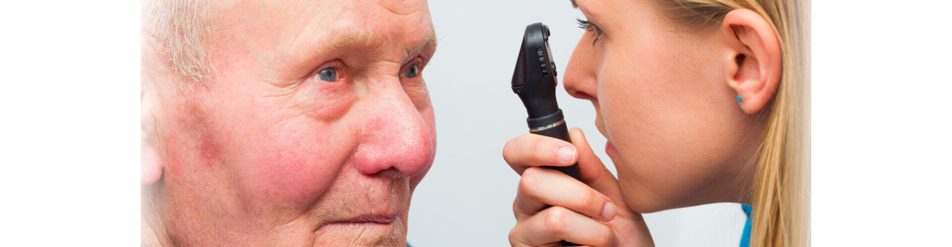 optician consulting elderly patient